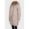 Coat with natural fur on the hood