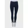 Jeans with slit and lace front
