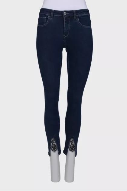 Jeans with slit and lace front