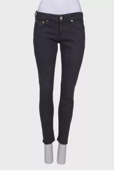 Gray jeans with gold hardware
