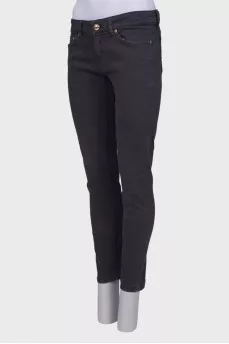 Gray jeans with gold hardware