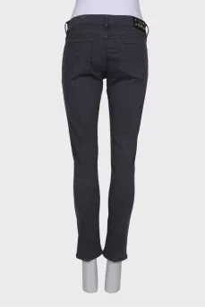 Gray jeans with gold hardware