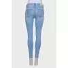 Light blue ripped effect jeans