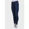Navy blue jeans with a zip at the bottom