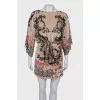Dress with a textured pattern at the waist