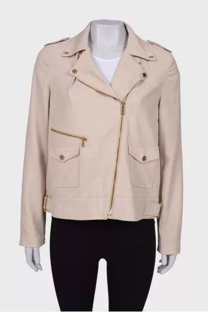 Windbreaker with gold hardware, with a tag