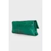 Green leather clutch