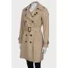 Beige belted trench coat