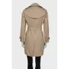 Beige belted trench coat