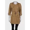 Brown coat with rhinestones at the collar