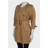 Brown coat with rhinestones at the collar
