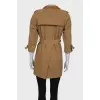 Brown coat with rhinestones at the collar