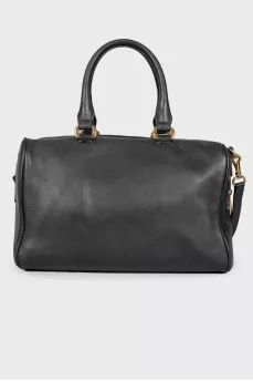 Black leather bag with tassel
