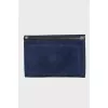 Dark blue clutch bag with tag