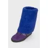 Insulated uggs on a hidden wedge