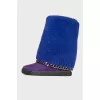 Insulated uggs on a hidden wedge