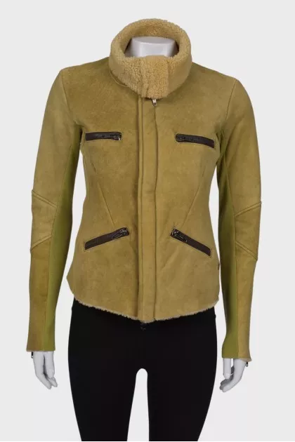 Green sheepskin coat on fur