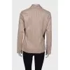 Beige jacket with wide lapels