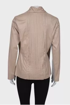 Beige jacket with wide lapels