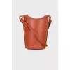 Bucket bag with gold-tone hardware