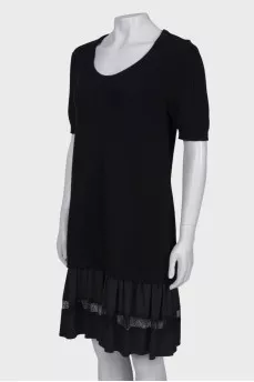 Knitted dress with ruffles at the hem