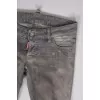 Gray jeans with paint stain effect