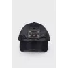 Black cap with brand logo