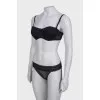 Black underwear with lace, with a tag