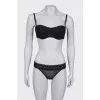 Black underwear with lace, with a tag