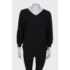 Black V-neck jumper with tag