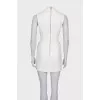 White dress close-fitting in the waist