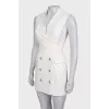 White dress close-fitting in the waist