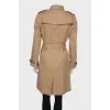 Beige double-breasted trench coat
