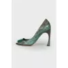 Green snakeskin embossed shoes