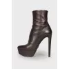 High-heeled leather ankle boots