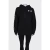 Black hoodie with brand logo