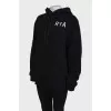 Black hoodie with brand logo