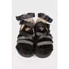 Black sandals with fur