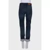 Dark blue jeans with a tag
