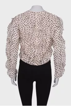 Polka dot blouse with ruffles