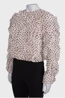 Polka dot blouse with ruffles
