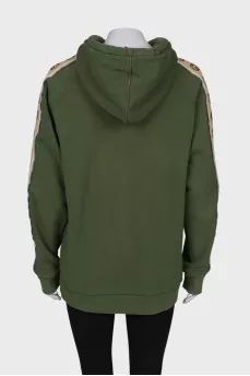 Green hoodie with brand logo