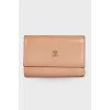 Powder colored leather wallet