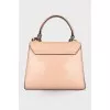 Powder colored leather bag
