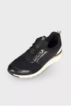 Black and white sneakers with brand logo