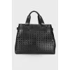 Black perforated bag