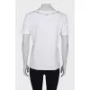 White T-shirt with beaded patch