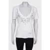 White T-shirt with beaded patch