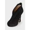 Black and gold suede ankle boots