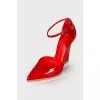 Red patent leather pumps